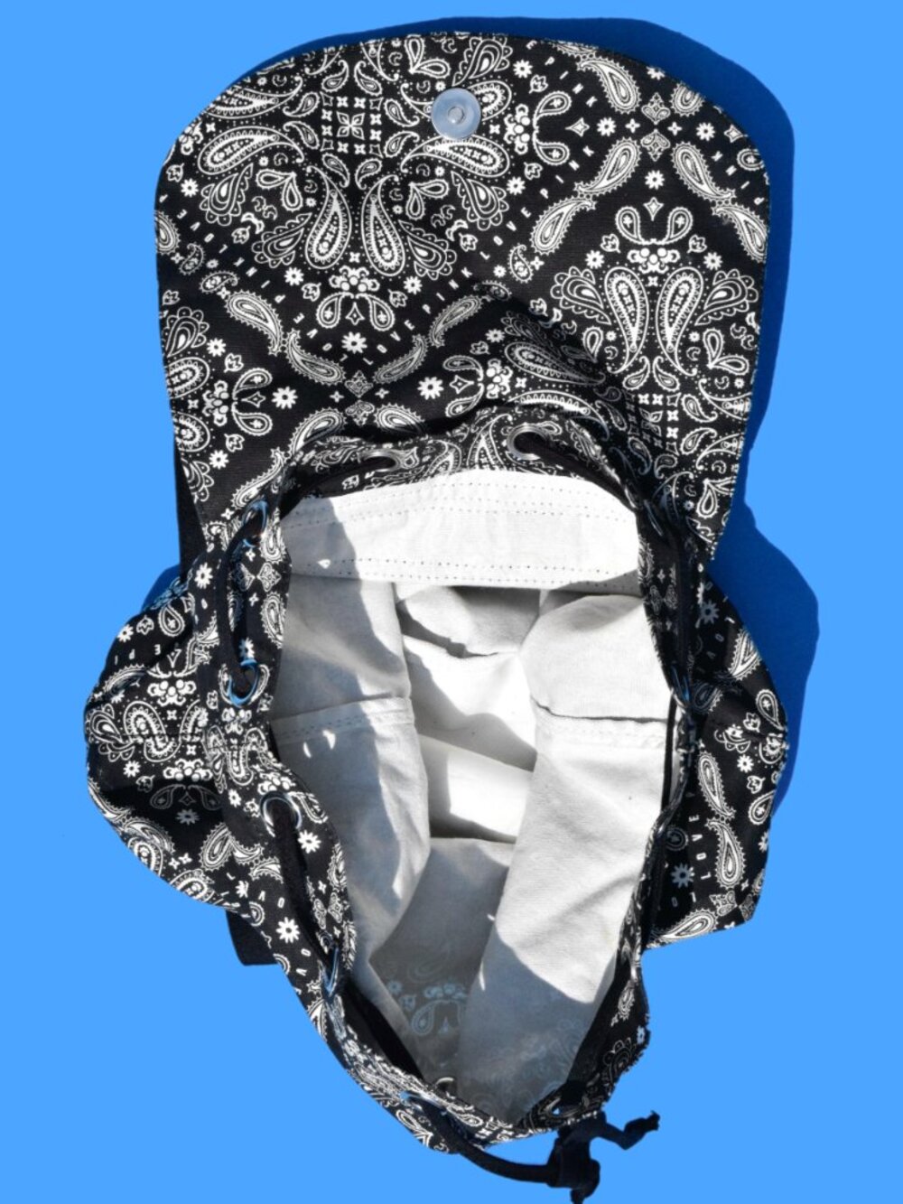 Mini canvas backpack featuring a bold black-and-white bandana/paisley print. Per - Picture 5 of 6